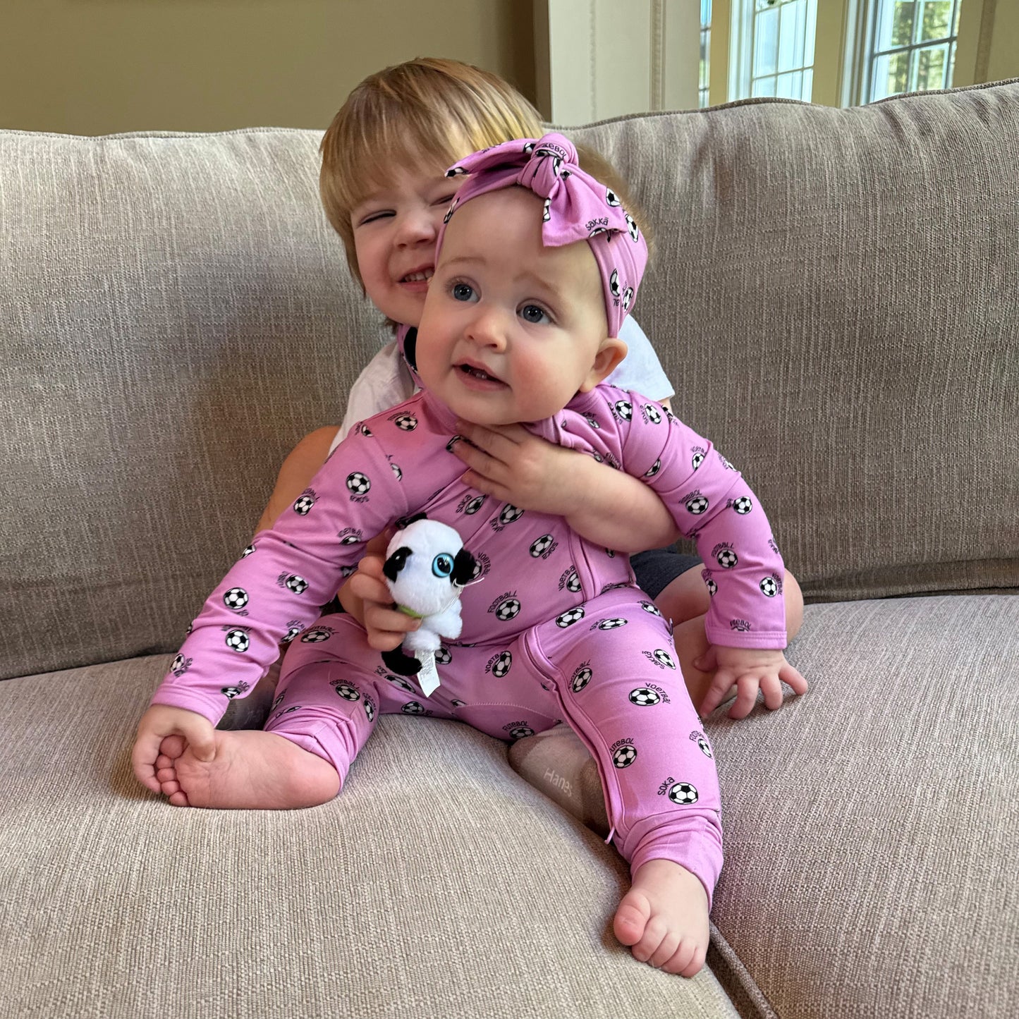 pink world soccer bamboo zipper footie